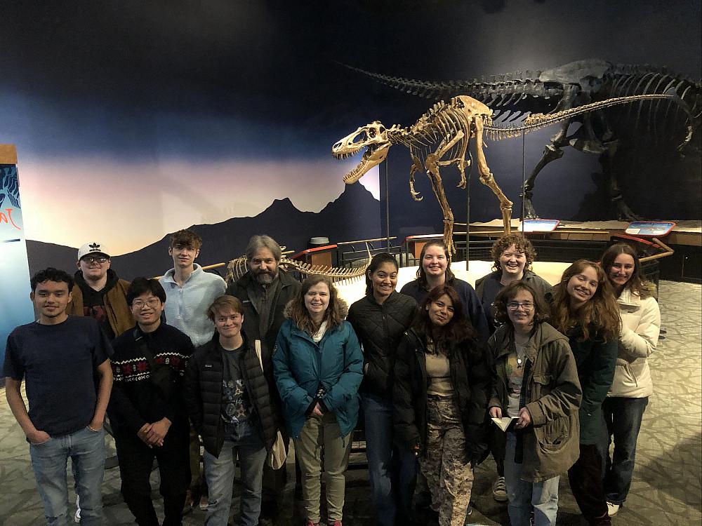 Group photo in front of Jane, the T. rex.